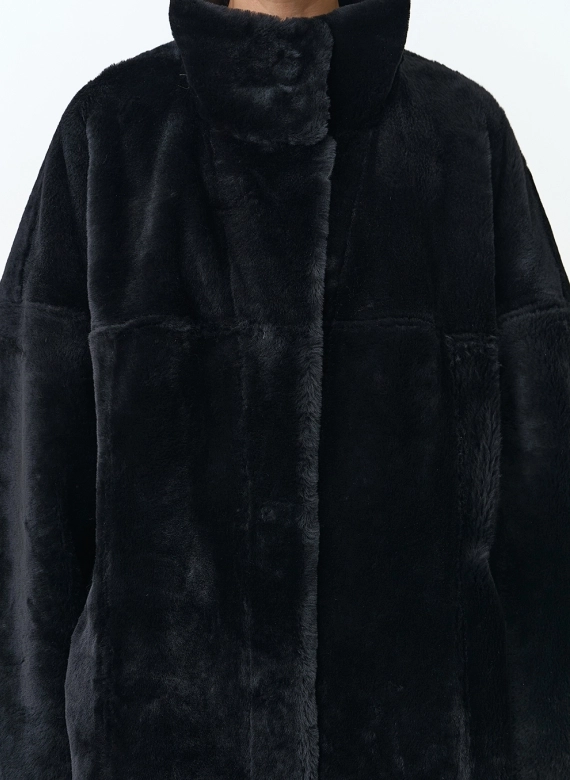 Женская двухсторонняя дубленка оверсайз фото