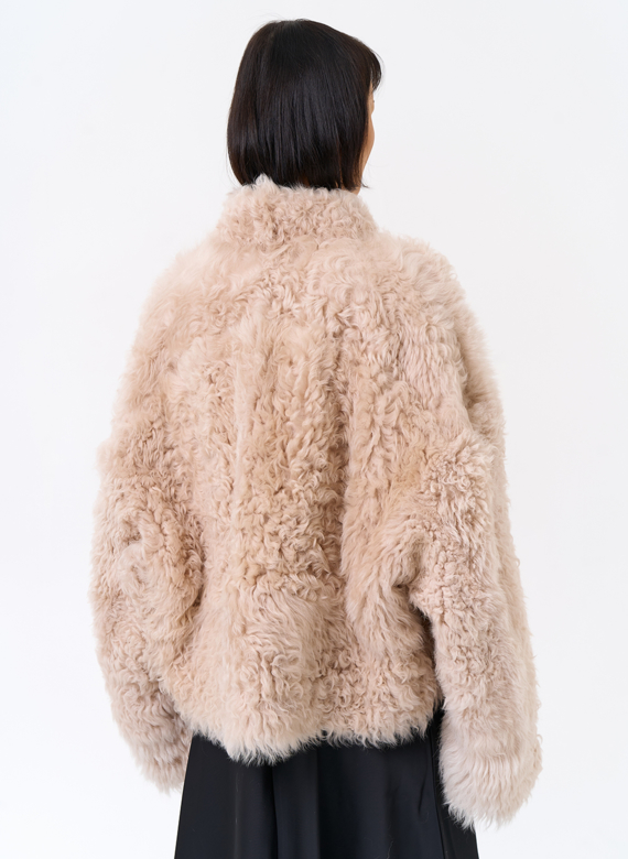 Женская короткая двухсторонняя дубленка 